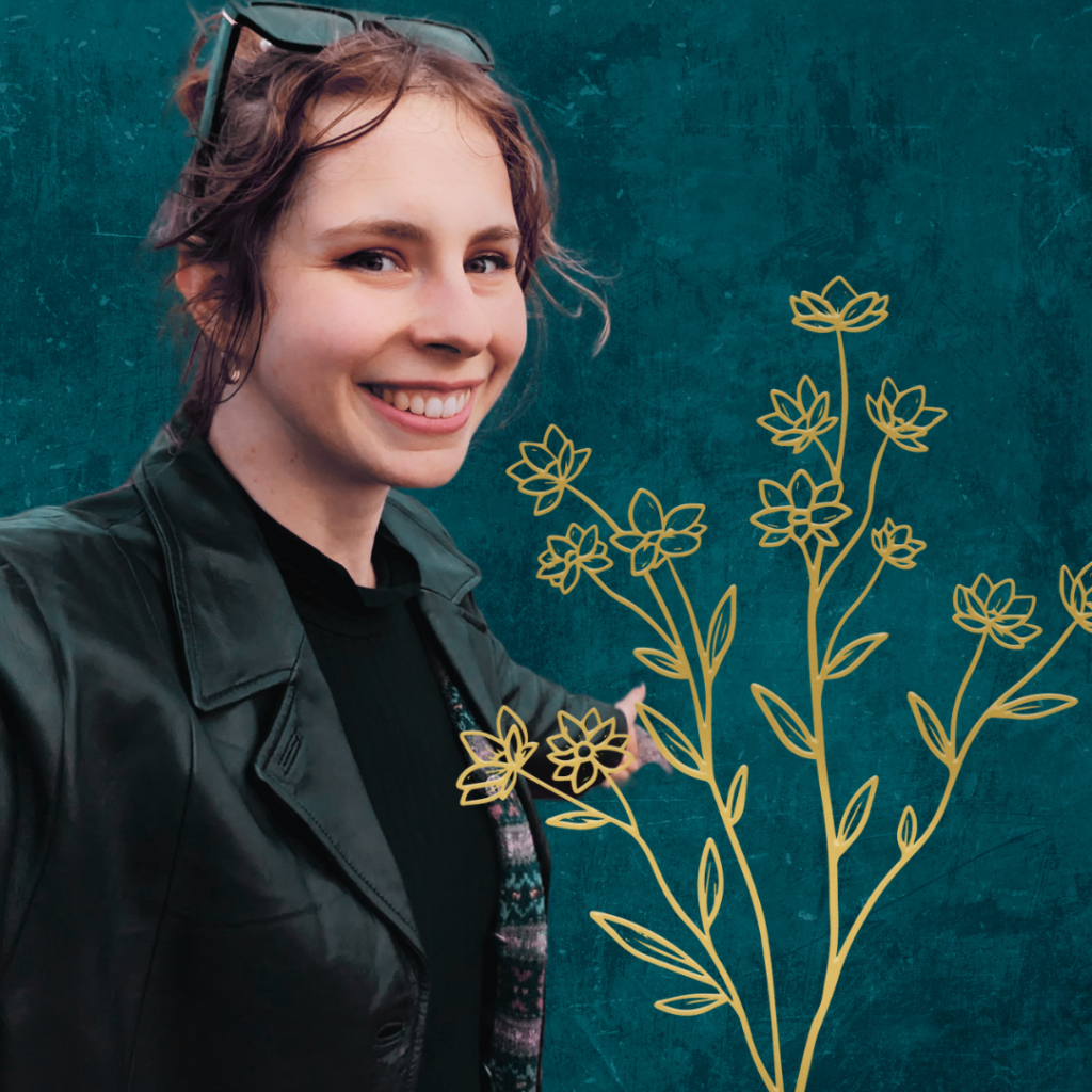 Sierra, a white woman smiling with sunglasses on the top of her head on a teal velvet background with a gold flower decoration